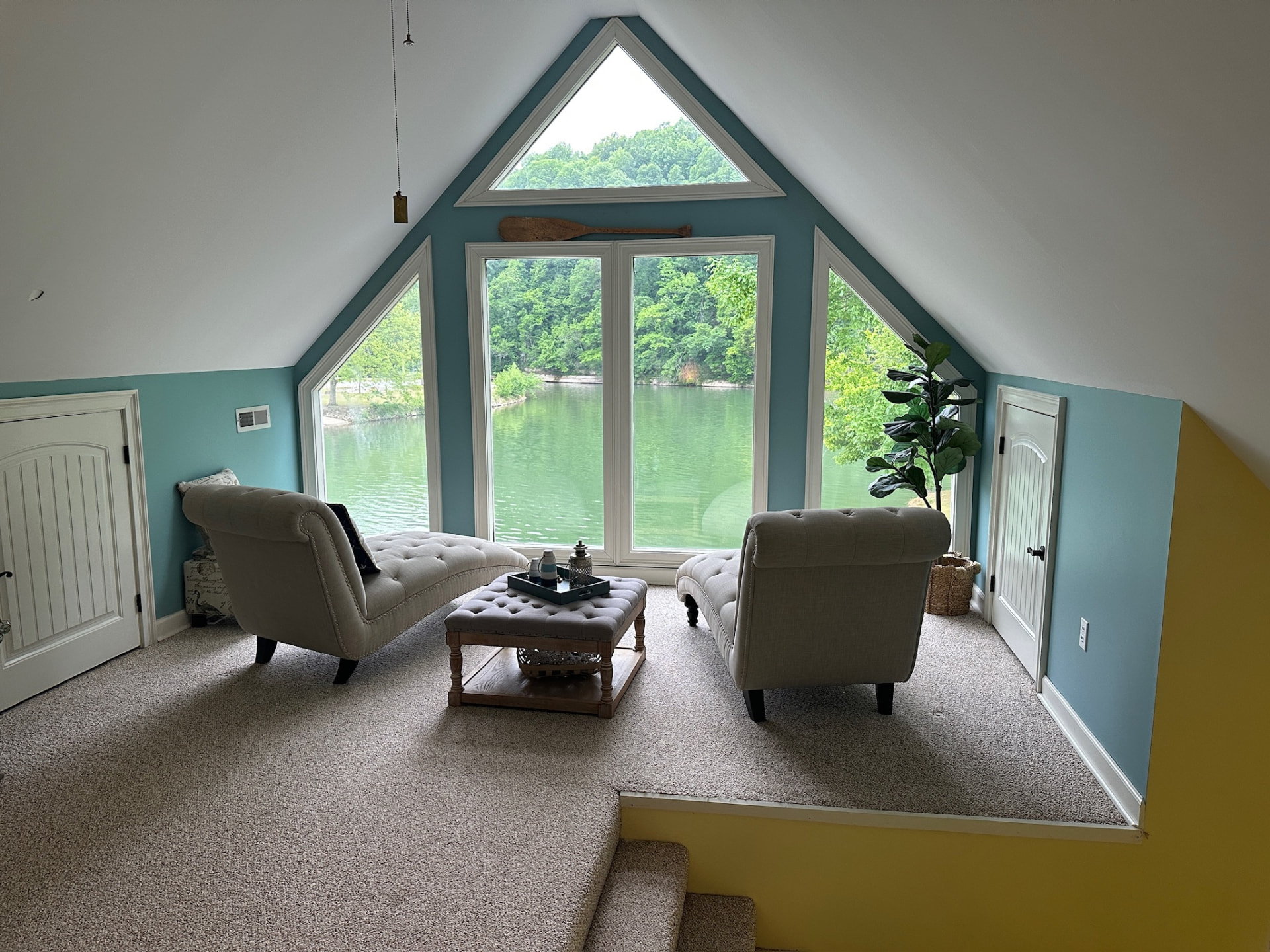 Upper loft sitting area with panoramic lake views