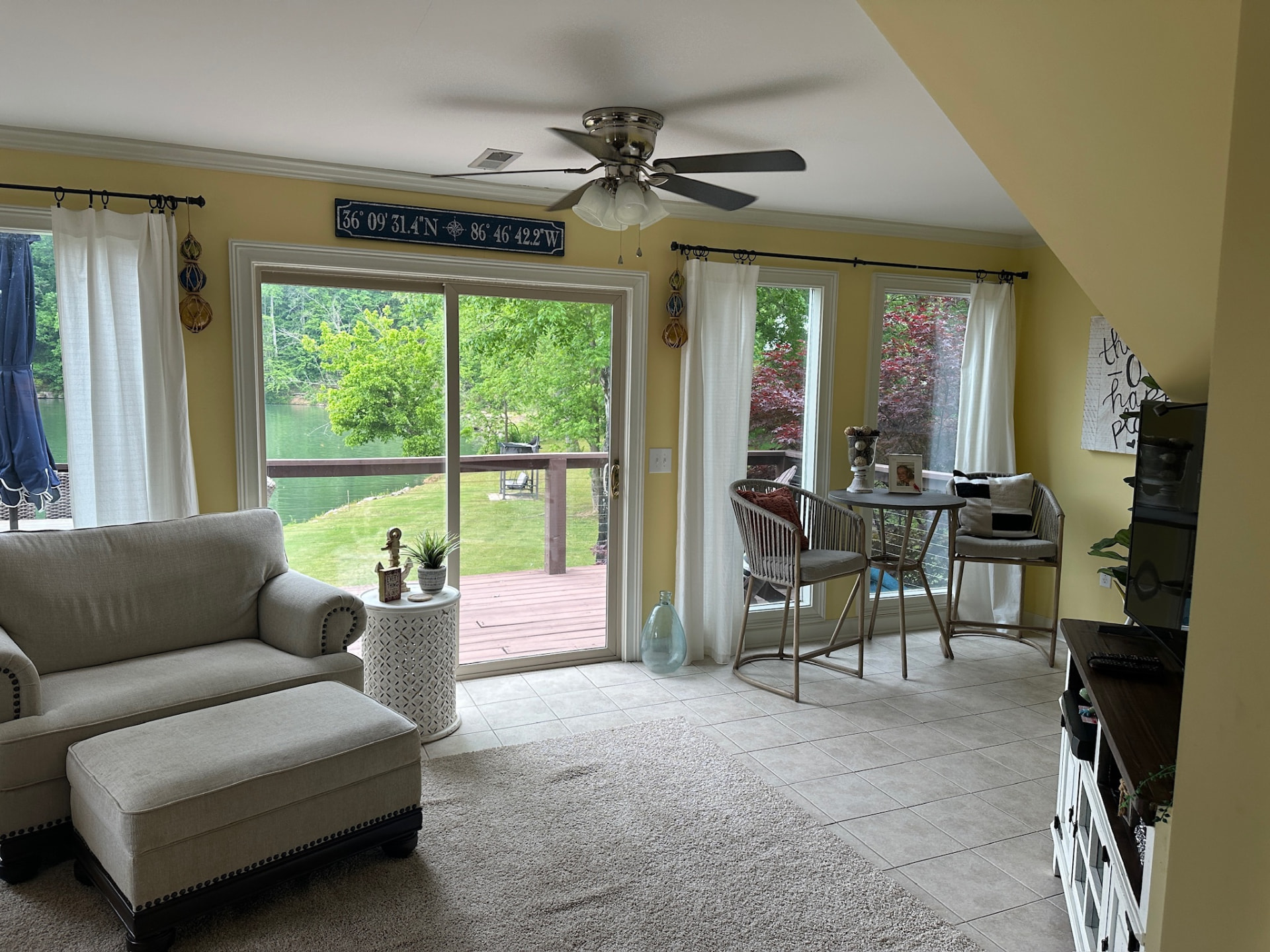 House #2 living room with sliding doors to the lakefront deck