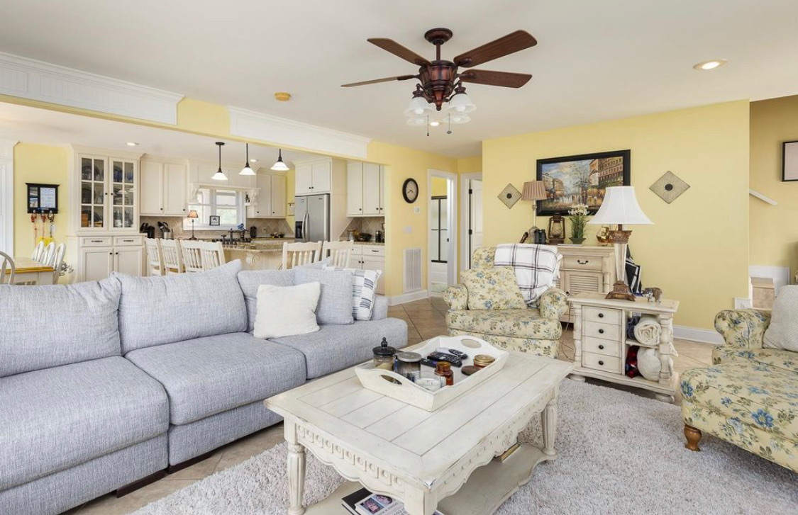 Spacious living room looking toward the kitchen and dining area