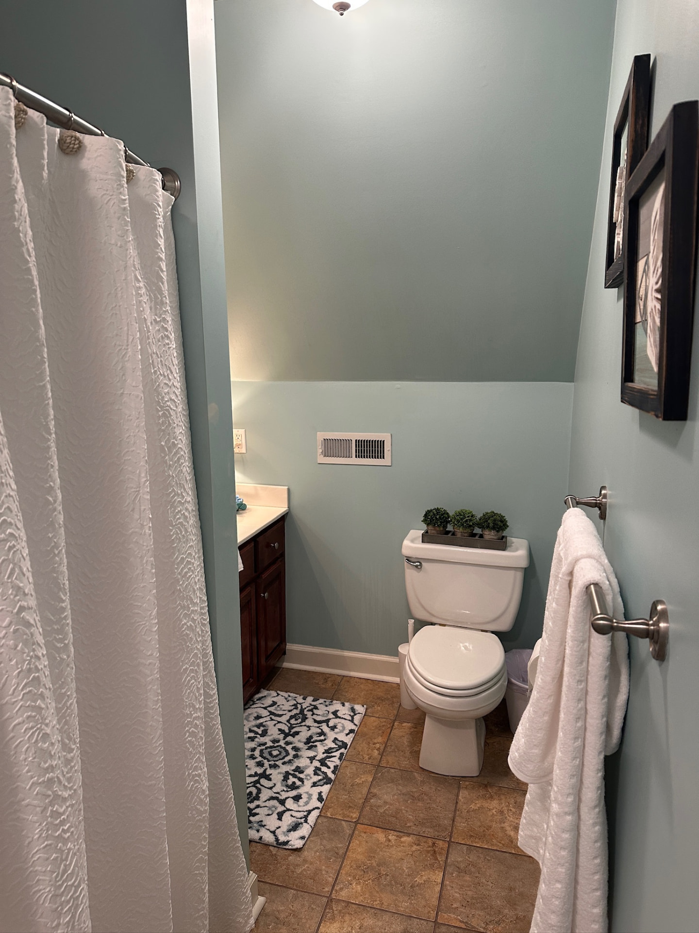 Full bathroom with shower and vanity
